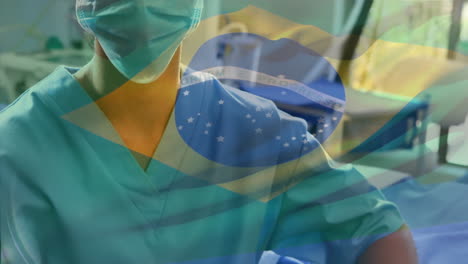 animación de la bandera de brasil ondeando sobre el cirujano en el quirófano