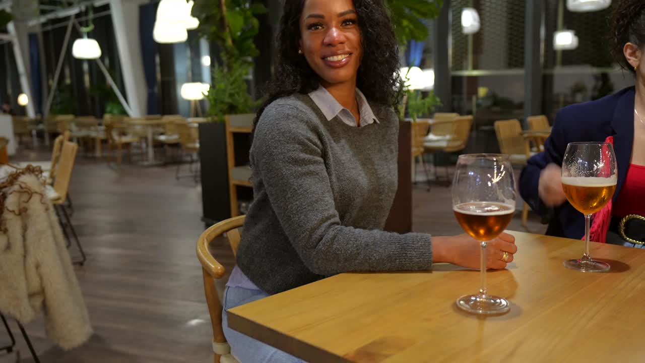 People enjoying drinks at a restaurant