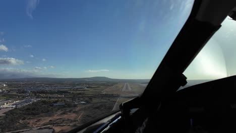 Immersive-pilot-POV-in-a-real-time-landing-at-Palma-de-Majorca-airport,-Spain,-with-some-turbulence