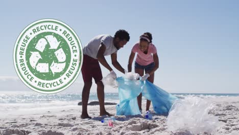 animation of recycling symbol over african american couple cleaning at beach