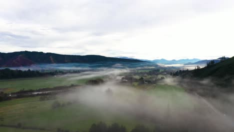 low and slow aerial passover a misty valley
