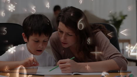madre enseñando matemáticas a su hijo