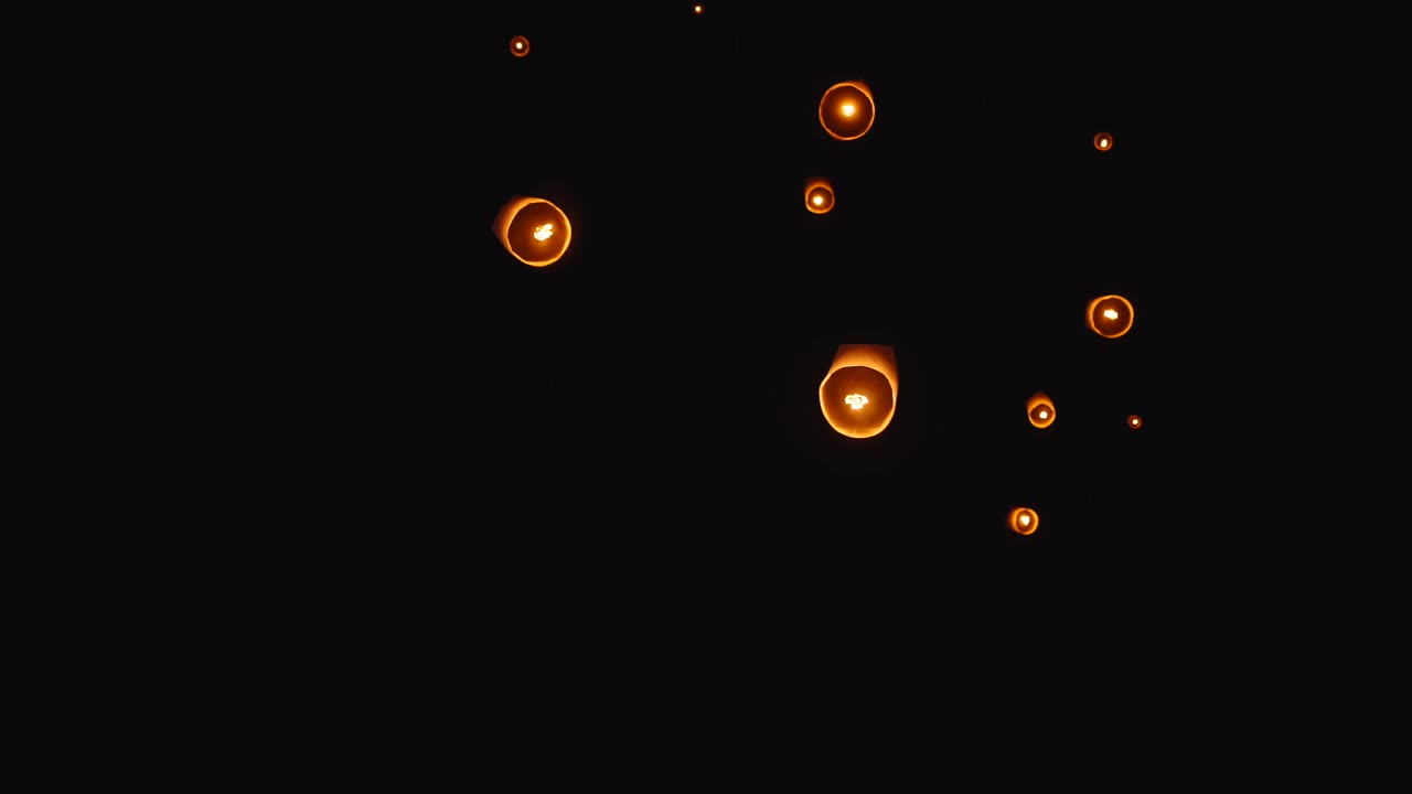 Sky Lanterns Floating at Night