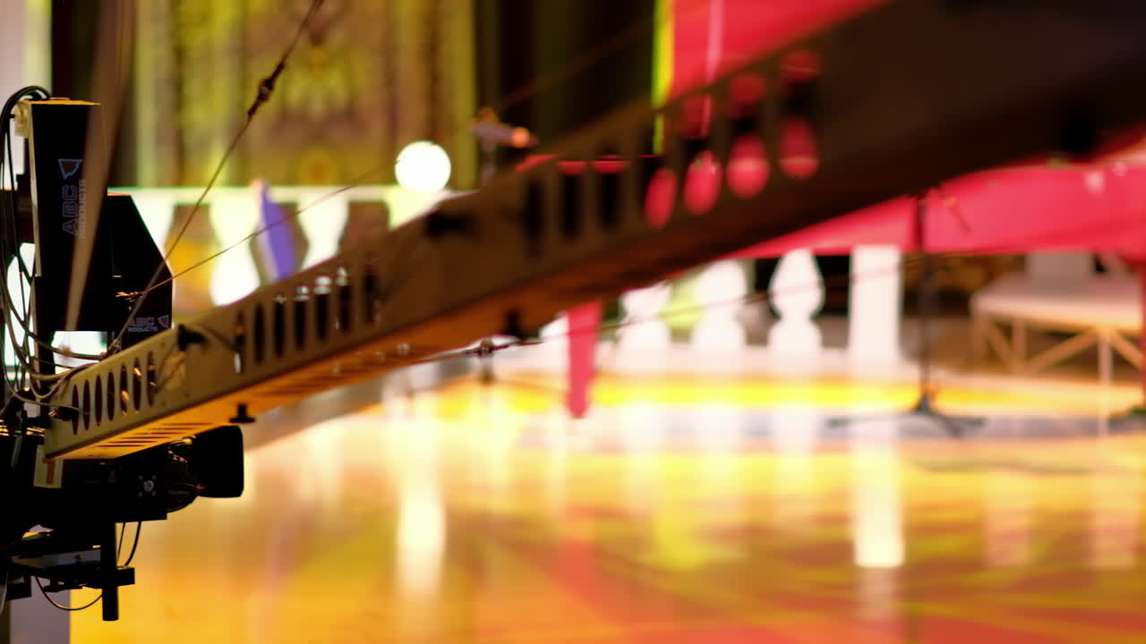 Professional camera filming with on the backstage of a TV set