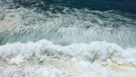 powerful waves crashing on the coastline