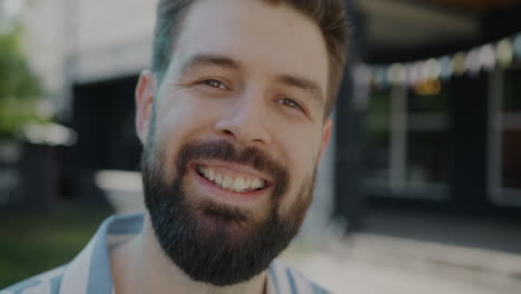 smiling man with a beard