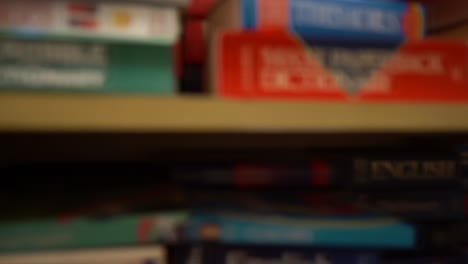 360-view-of-hundreds-of-books-stacked-together-on-bookshelves-indoor