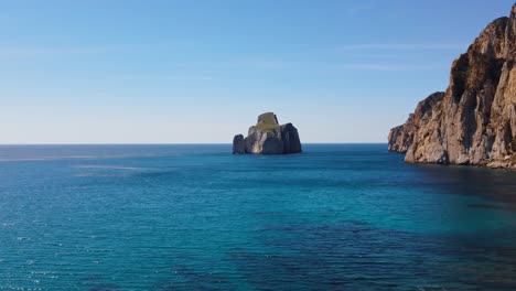 amazing aerial establisher of masua sea stack, pan di zucchero in sardinia