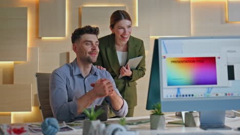 two coworkers video calling by computer in agency. woman boss introducing man