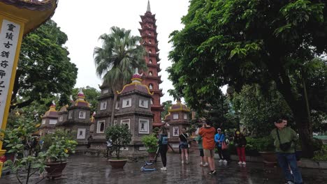 tourists exploring the historic tran quoc pagoda