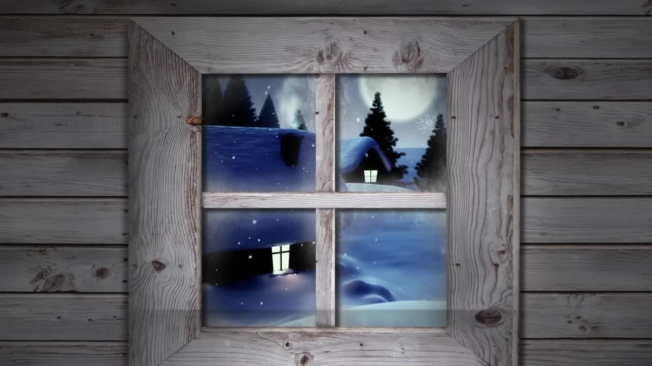 marco de ventana de madera contra los copos de nieve que caen sobre varias casas y árboles en el paisaje de invierno