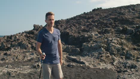 Male-traveler-walking-near-blowhole