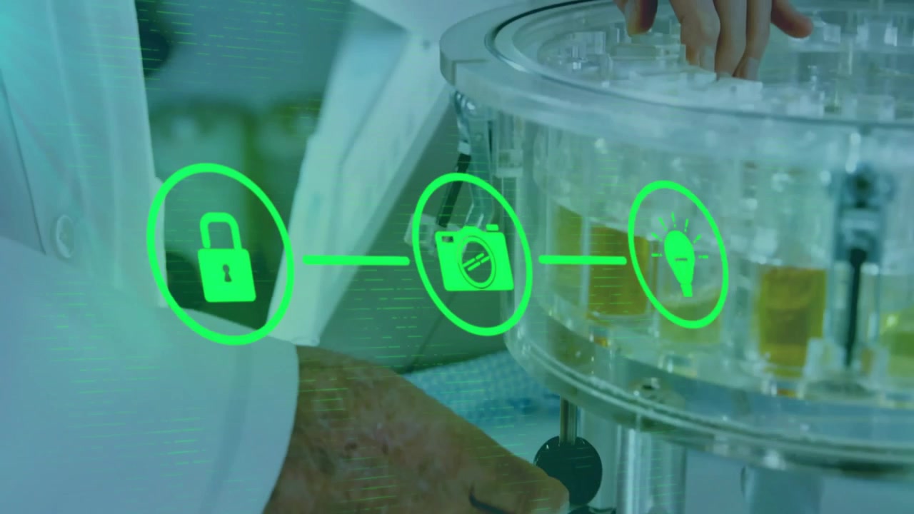 Scientist Working with Automated Laboratory Sample Analyzer
