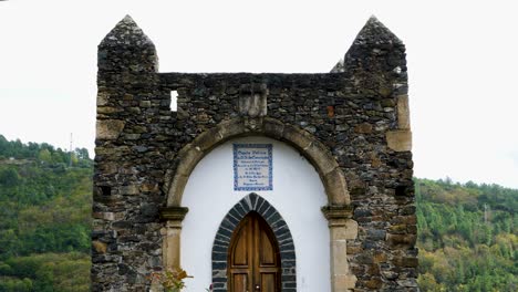 tilt up along sacred church castle entrance in vinhais, braganza, portugal