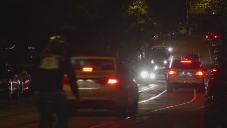 baltimore avenue traffic, cars, headlights, night, west philadelphia