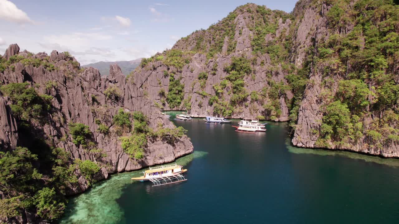 Coron Island, Philippines. Aerial View of Paraw Boats in Winn Lagoon, Popular Tourist Attraction