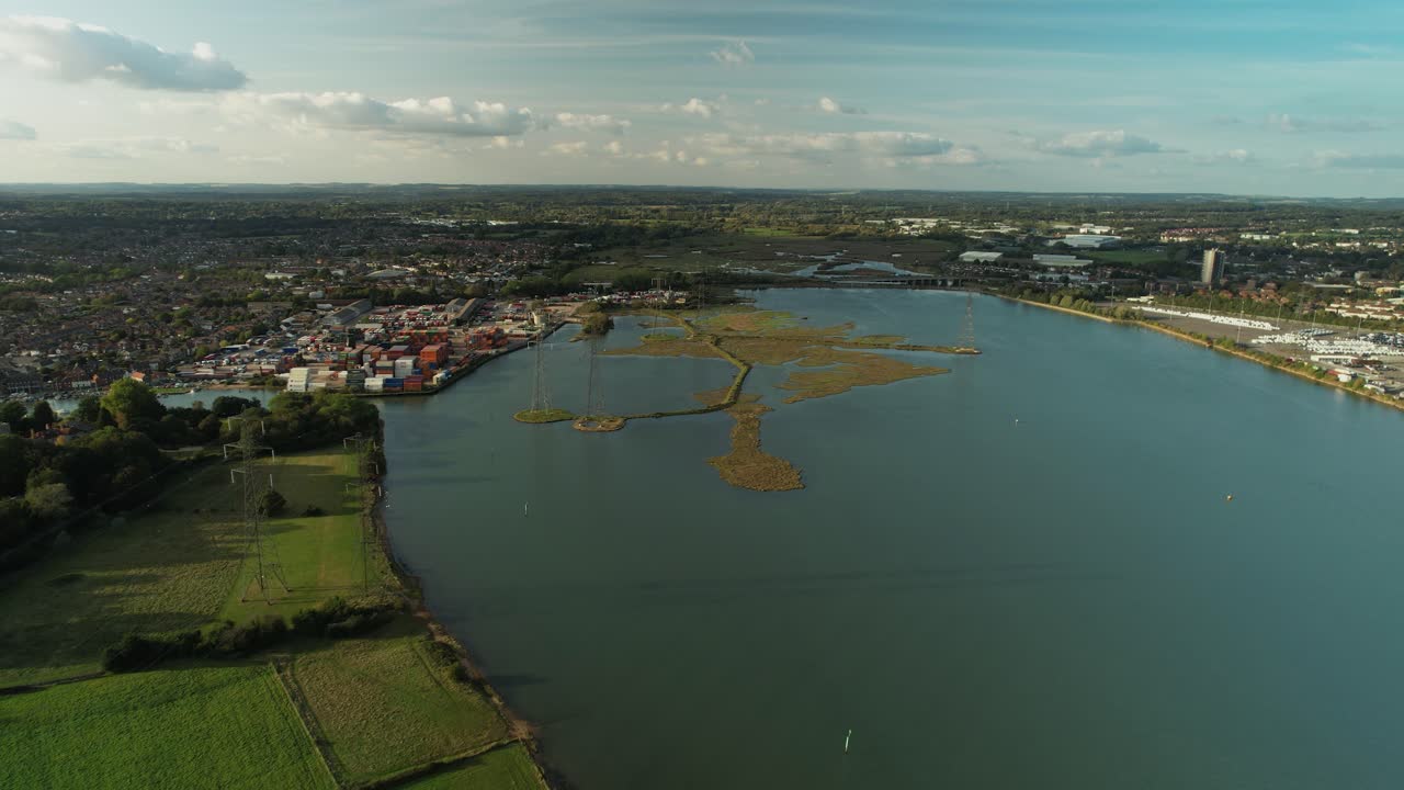 High angle shot over high  voltage transmission towers planted on Southamptons wetlands
