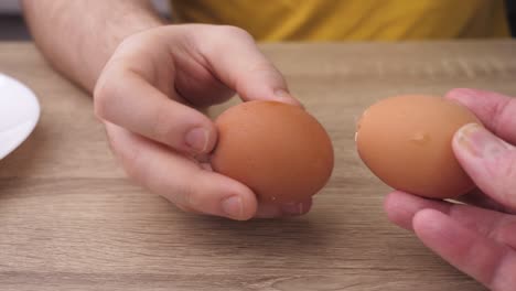 boiled eggs, slicing and preparing eggs for making olivier salad, salad making concept