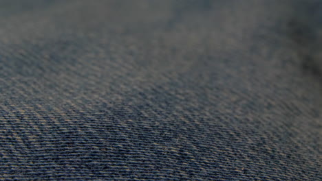 a blue jeans texture pattern closeup macro from sharp to blurry, shot in 4k 60p 10bit, prores422, with external atomos recorder