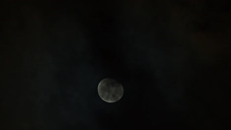 moon through clouds at night
