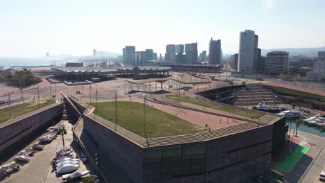 aerial-drone-view-of-forum-park-in-barcelona-empty-without-people-on-a-sunny-day