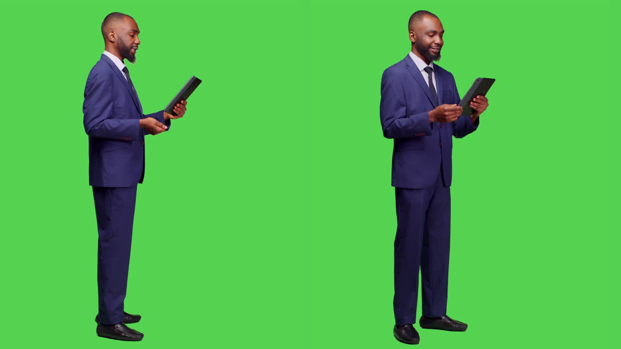 Empresário africano profissional de terno usando tablet