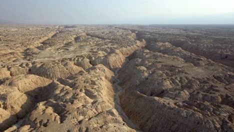 aerial footage over soft sedimentary rock desert wadi israel