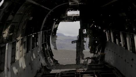 hand-held shot of the interior of the crashed plane on sólheimasandur beach