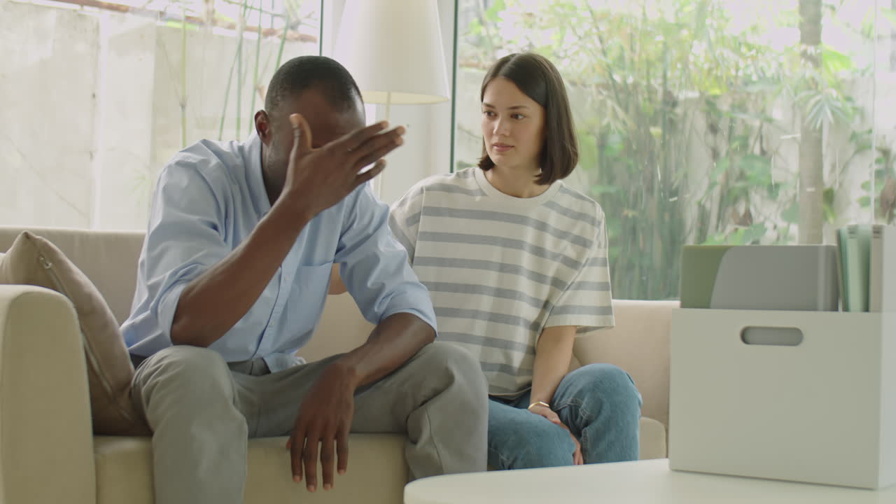 Wife Consoling Husband after Job Loss