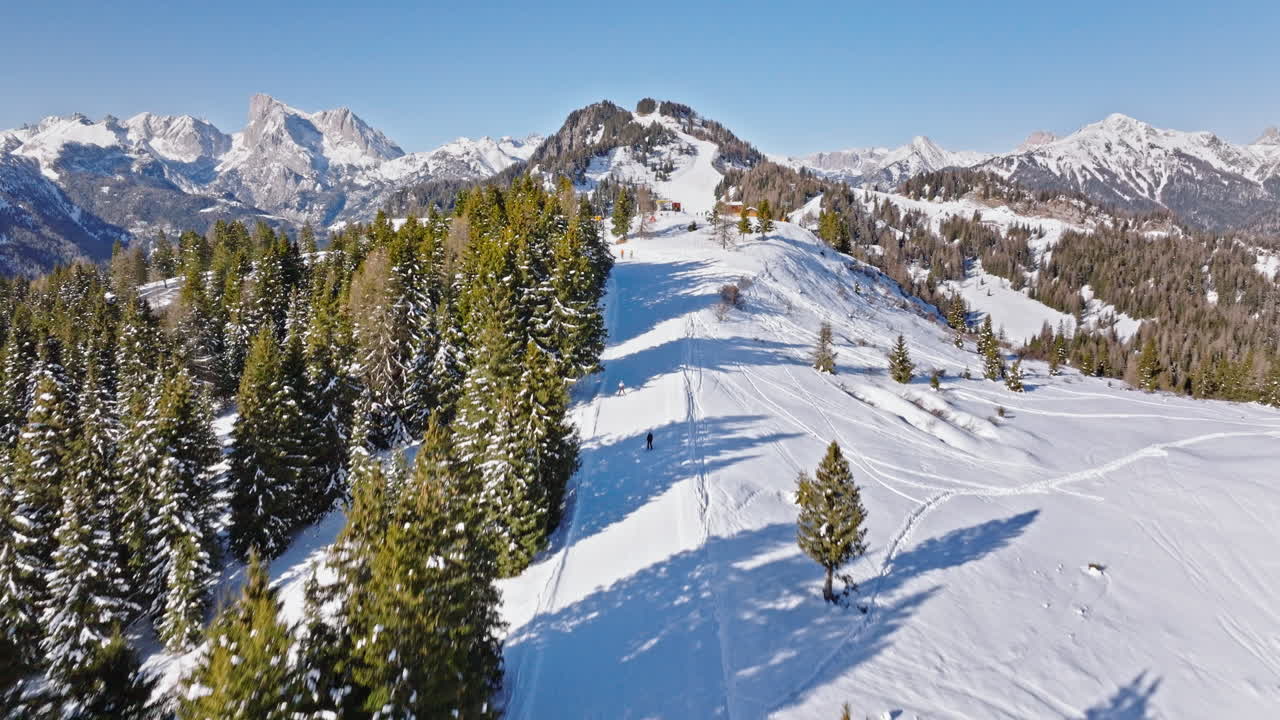 Aerial drone view of Col dei Baldi, Alleghe, in the Dolomites, Italy in daylight