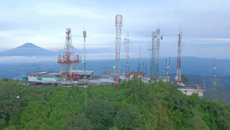 aerial view of antenna towers on the top of mountain