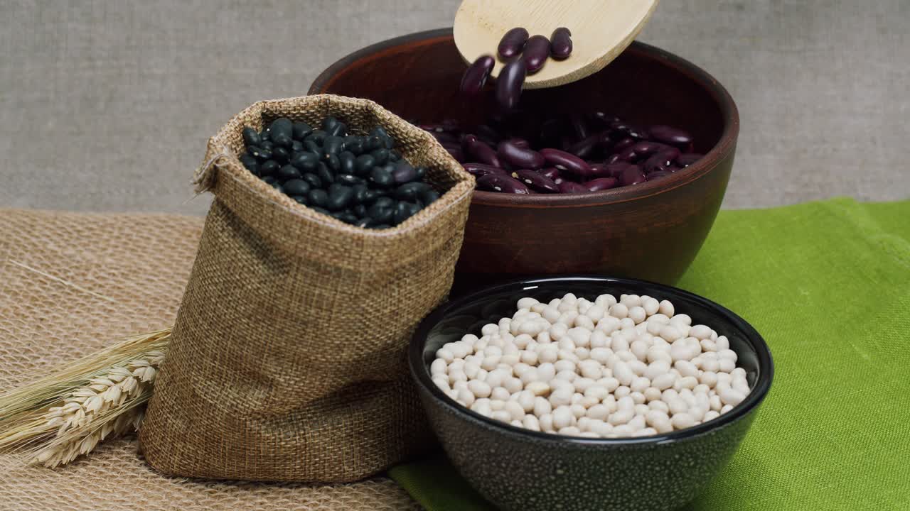 Red Kidney Beans Poured into Bowl with Other Dry Beans