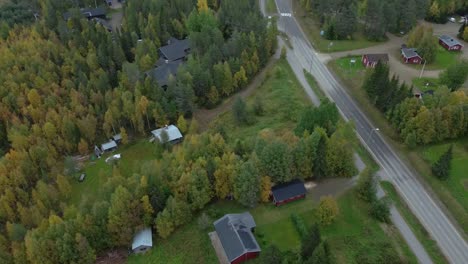 Aerial-drone-shot-over-town-near-water-in-Iceland