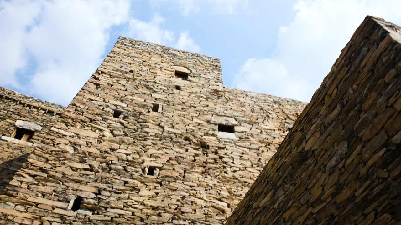 Low angle view of the exterior walls of buildings in Saudi Arabia traditional Thee Ain, Dhi Ayn or Zee Ain village