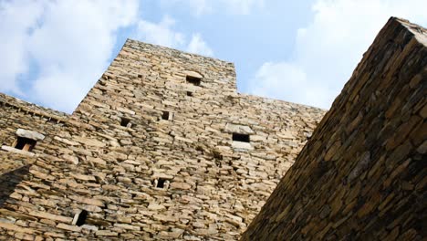 low angle view of the exterior walls of buildings in saudi arabia traditional thee ain, dhi ayn or zee ain village