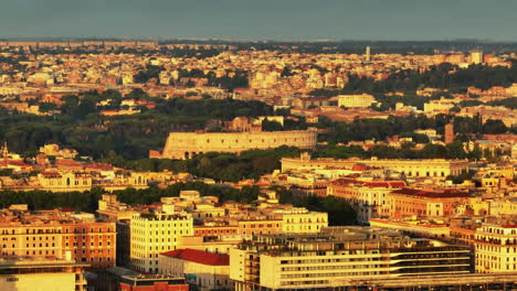 Aerial-slide-and-pan-footage-of-famous-historic-landmarks-in-city.-Colosseum-amphitheatre-and-surrounding-historic-buildings.-Rome,-Italy