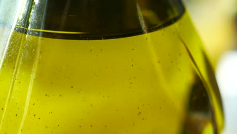 olive oil in a glass bottle