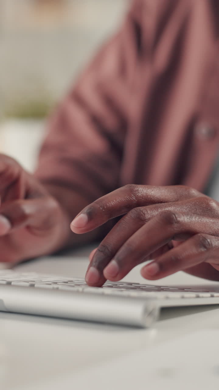 Close-up of Person's Hands Typing on a Computer Keyboard