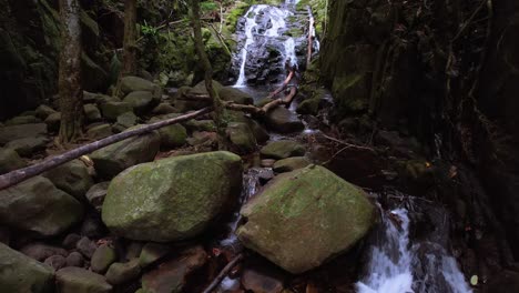 forward drone shot of lost waterfall on mahe island seychelles