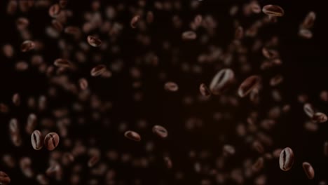 beautiful abstract roasted coffee beans of arabica and robusta fall slow motion on brown background