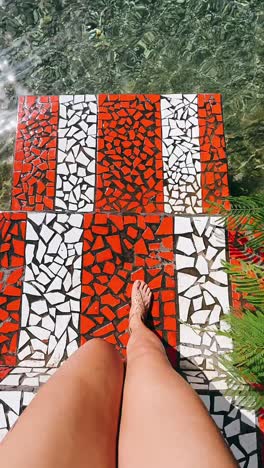 mosaic steps by a pool