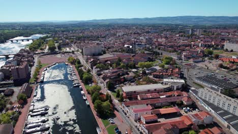 aerial shot over roanne city revealing the harbor on a sunny day, loire departement, auvergne rhone alpes region, franceauvergne
