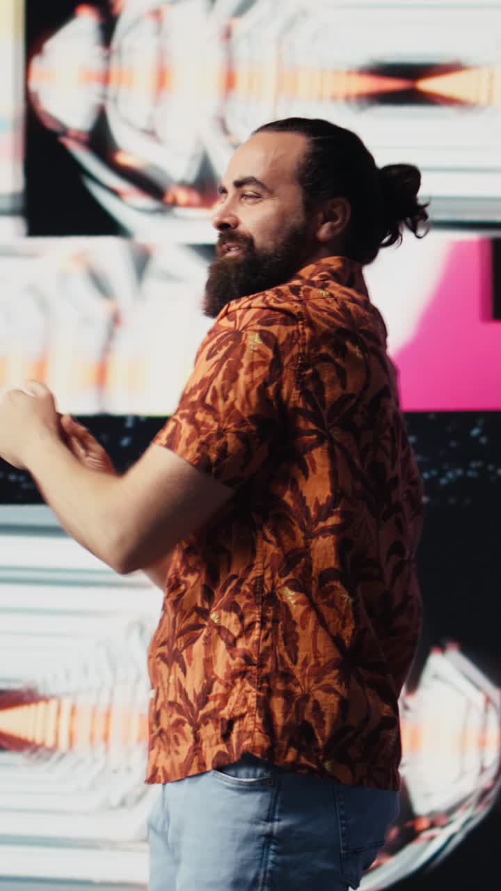 Vertical Video Cool digital content creator dancing under glowing neon lights