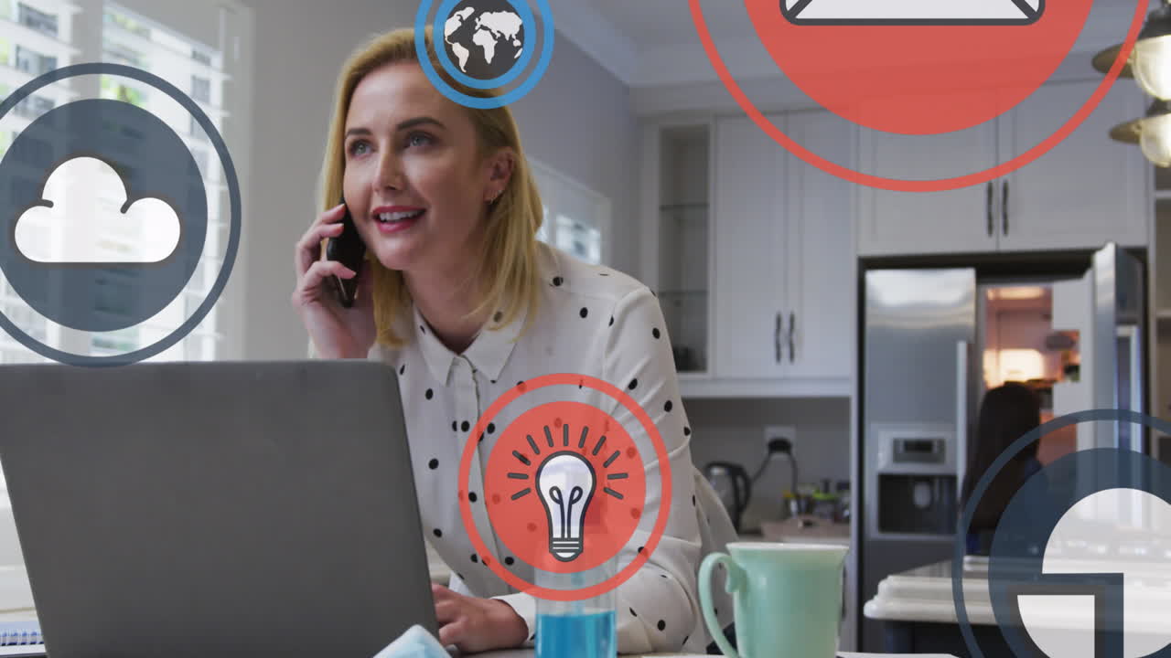 animación de iconos digitales sobre mujer rubia caucásica hablando en un teléfono inteligente usando una computadora portátil