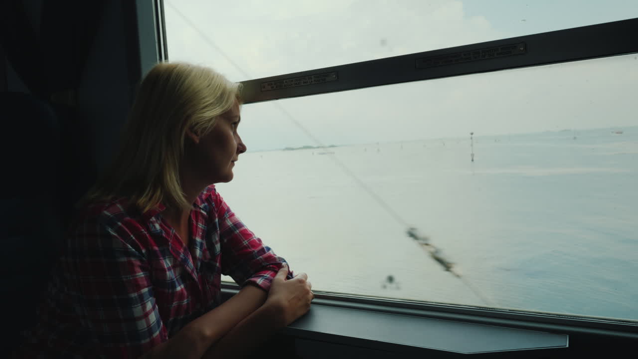 Woman On Train Arriving At Santa Lucia Station Venice