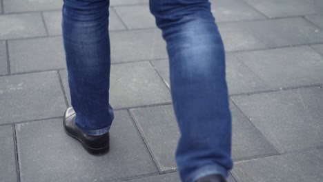 person walking on a paved surface