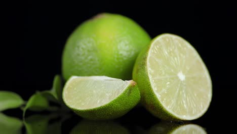 fragrant ripe lime with leaves rotates slowly.