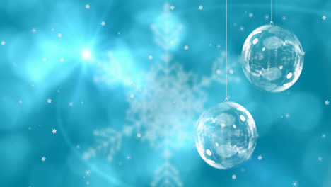 Animation-Von-Weihnachtskugeln-über-Schneeflocken-Auf-Blauem-Hintergrund