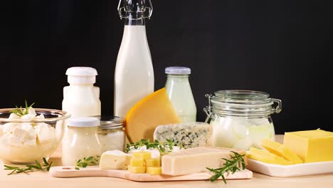 assorted dairy products on wooden background