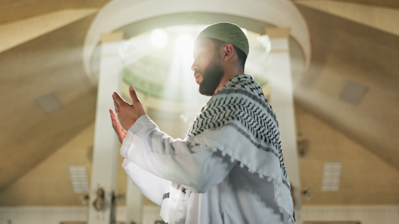 Muslim man praying in a mosque